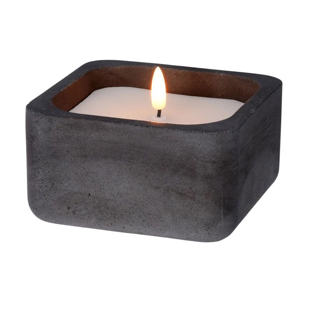 Led stearinlys i svart betongkrukke